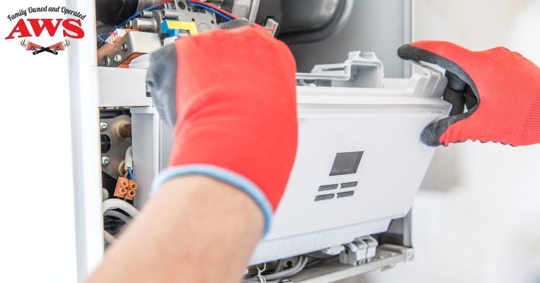 hands on furnace to fix it