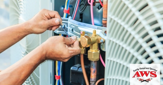 Technician repairing unit