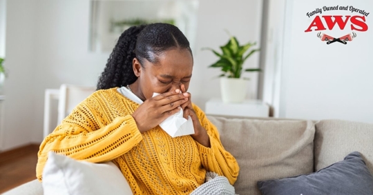 woman sneezing