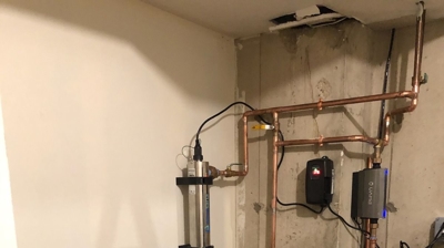 Aquasana Water Filter with Uponor Phyn Flood Stop Photo
